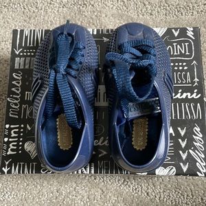 Like new blue Mini Melissa toddler size 6 shoes.